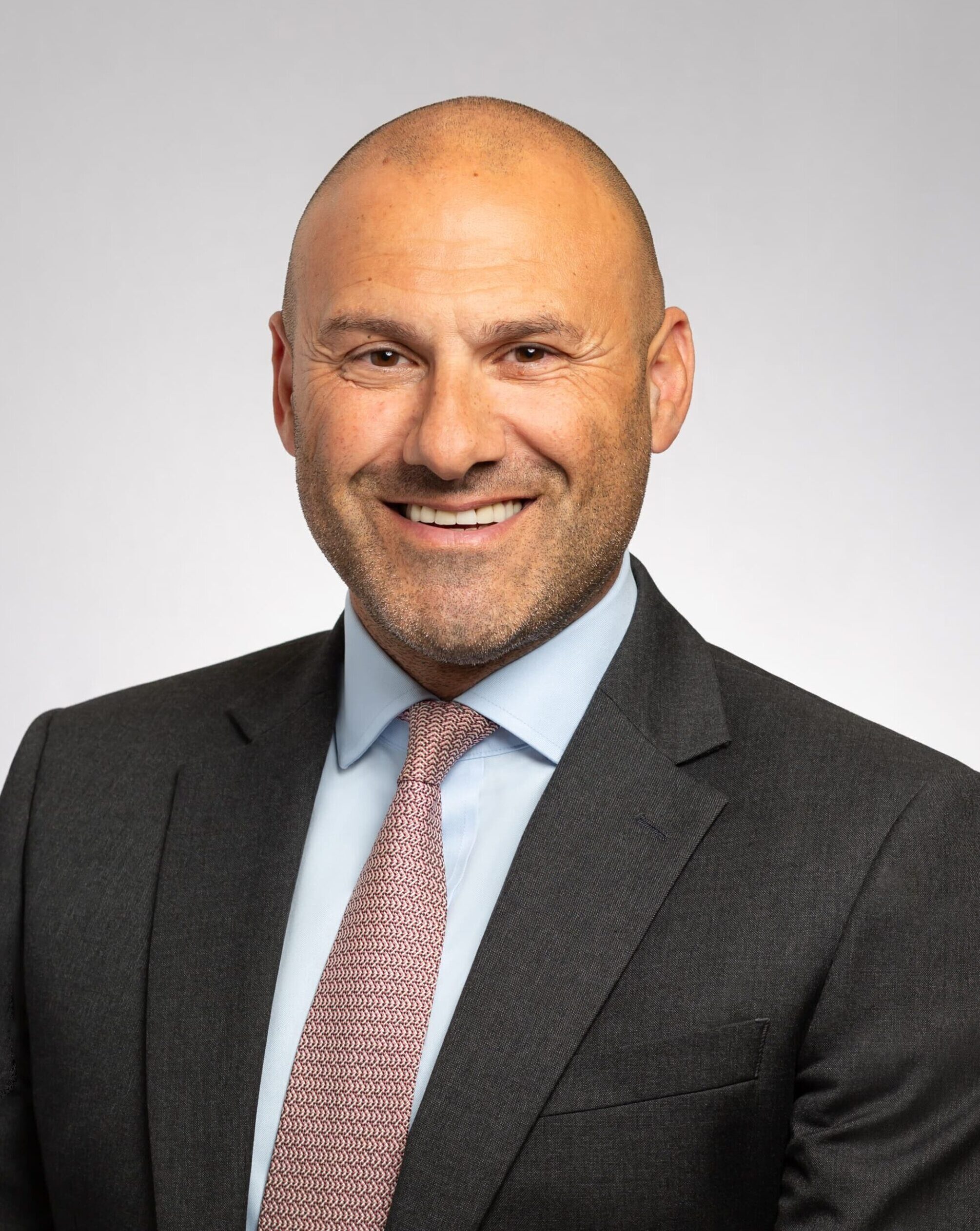 Investec Hires Terry Koizou to Lead UK Mid-Market CRM Build-Out